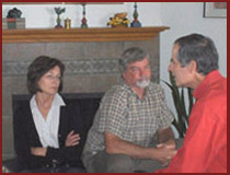 couple listening to Dr. James Cole